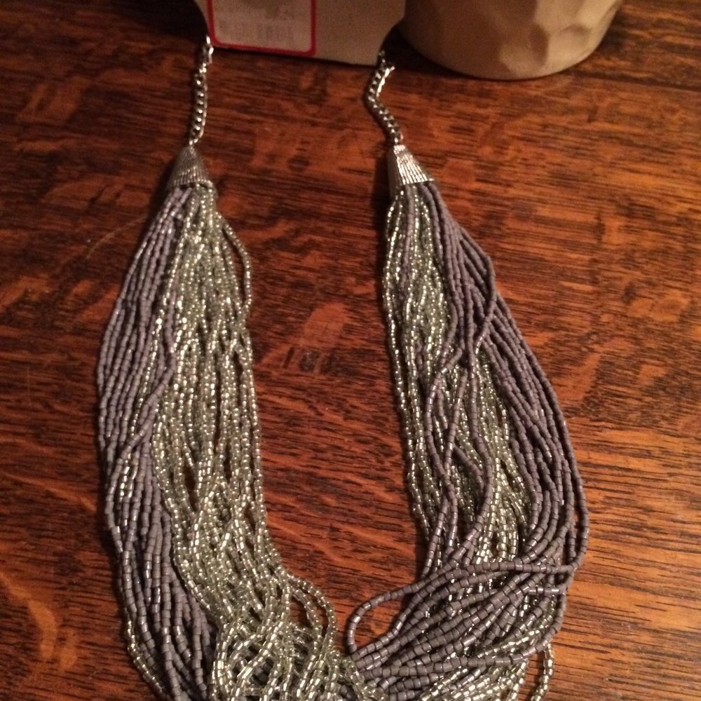 New One Wink Silver/Grey beaded necklace